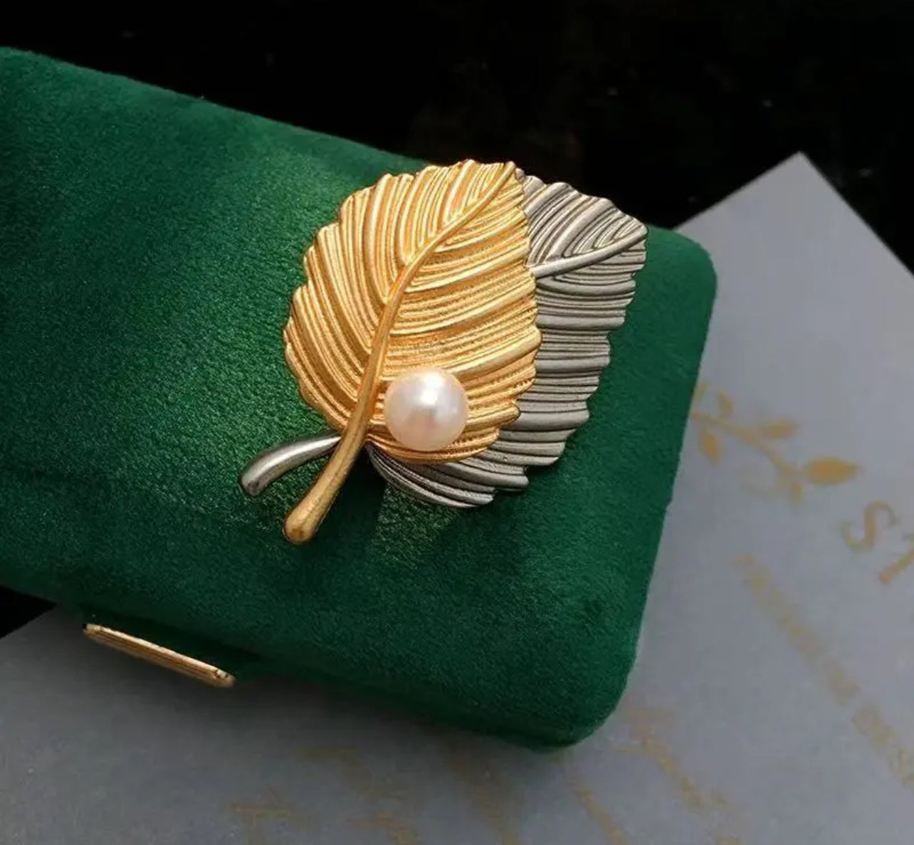 Elegant Gold and Silver Leaf Brooch with Pearl