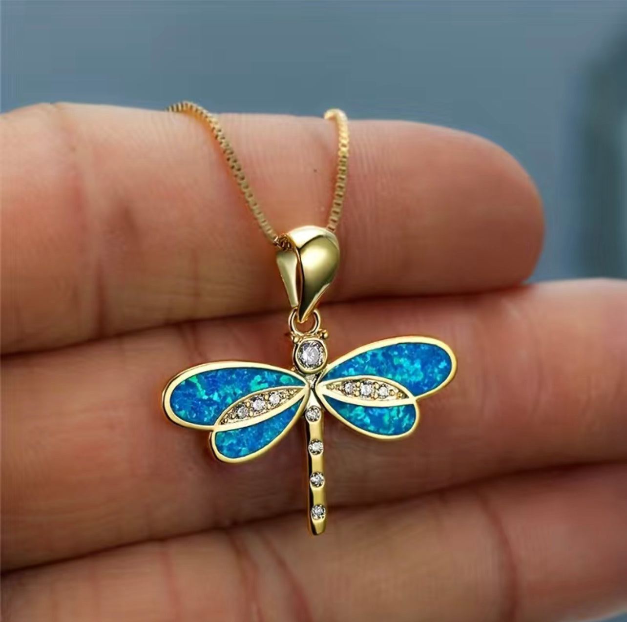 Enamel gold plated dragonfly necklace with box chain .