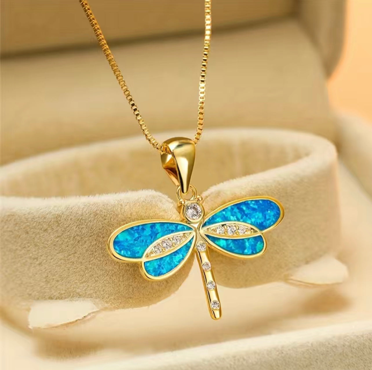 Enamel gold plated dragonfly necklace with box chain .