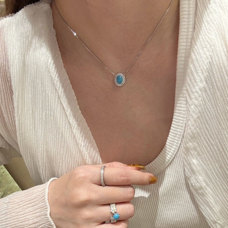 Synthetic turquoise cubic zirconia pendant necklace