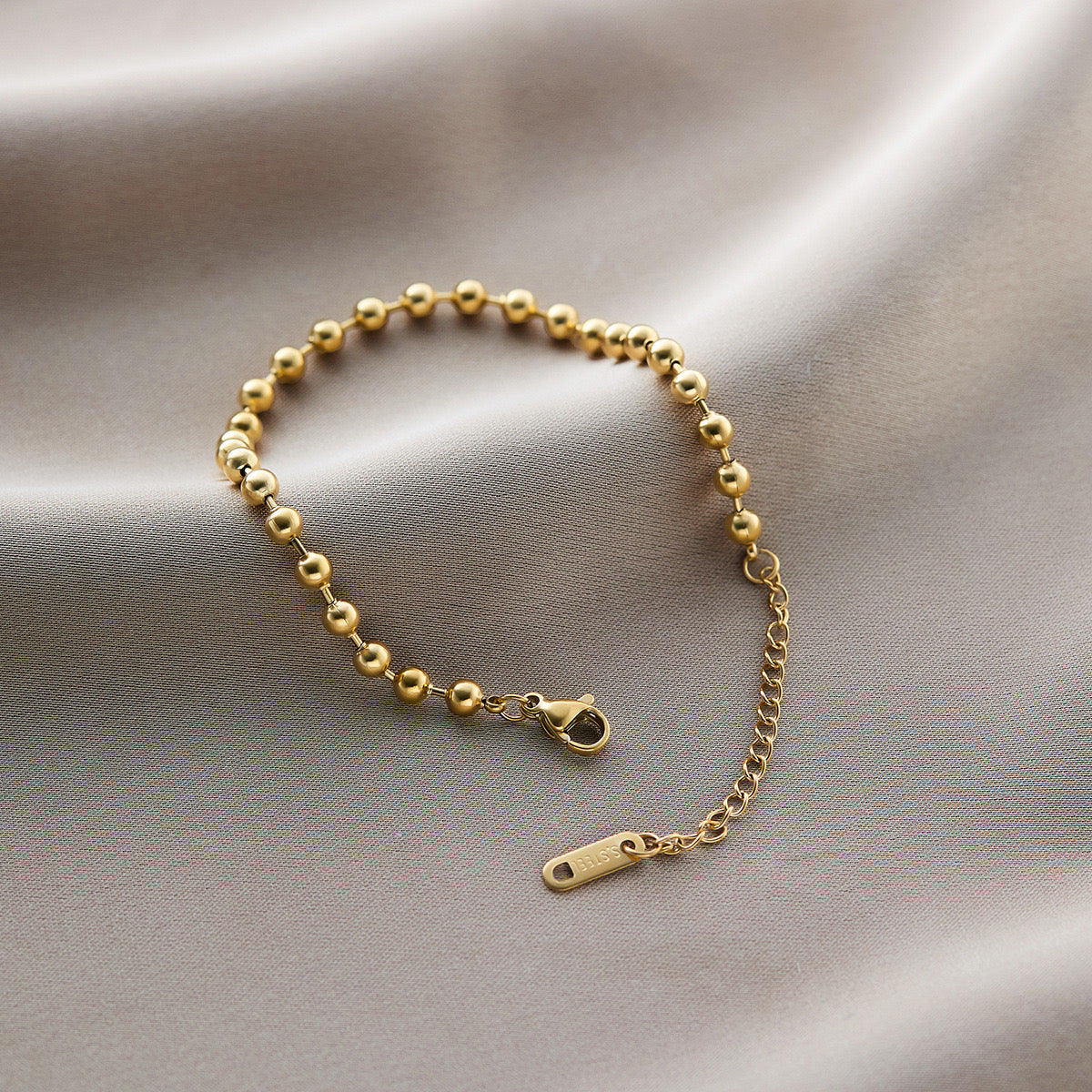 Gold plated ball bracelet