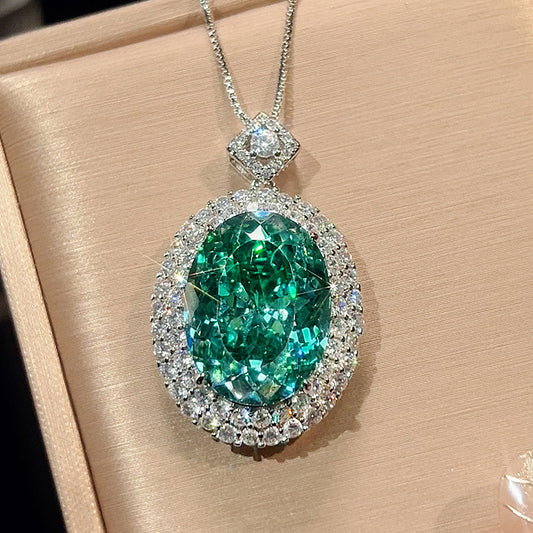 Green crystal cubic zirconia white gold plated pendant and chain