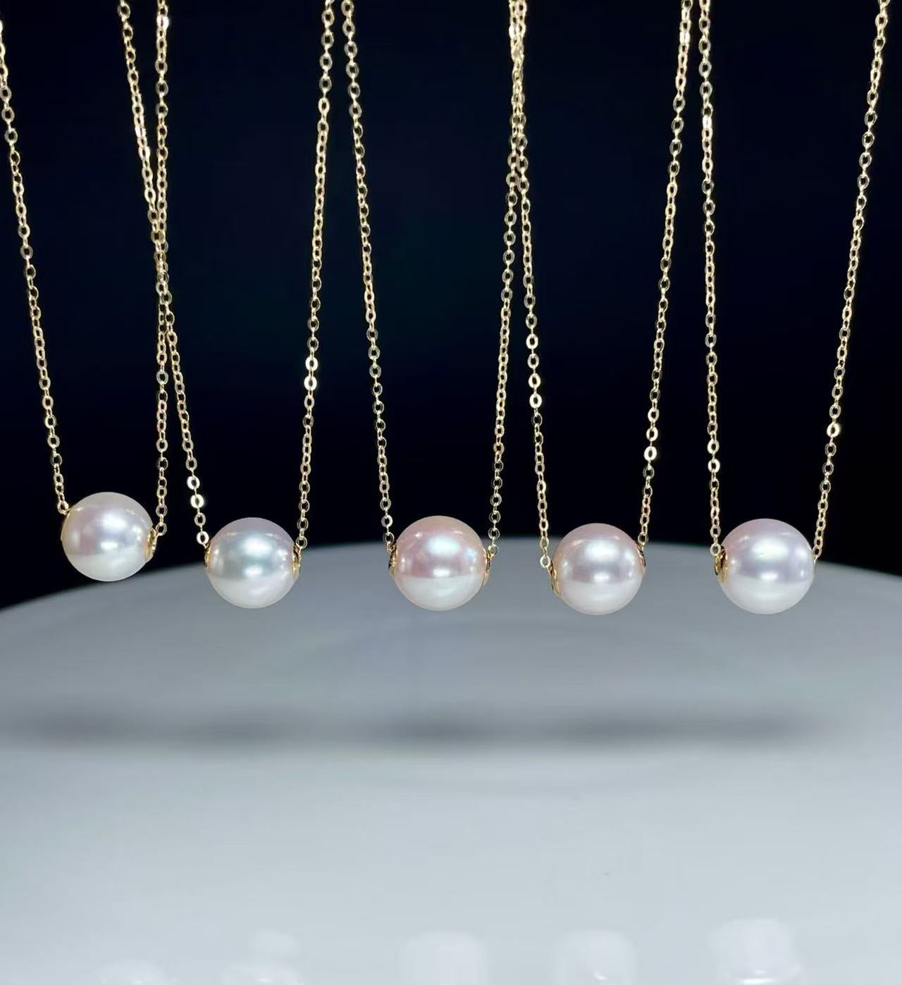 18 karat gold pearl slide pendant necklace