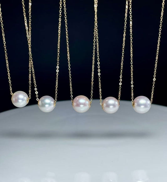 18 karat gold pearl slide pendant necklace