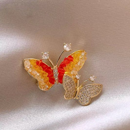 Double butterfly pin