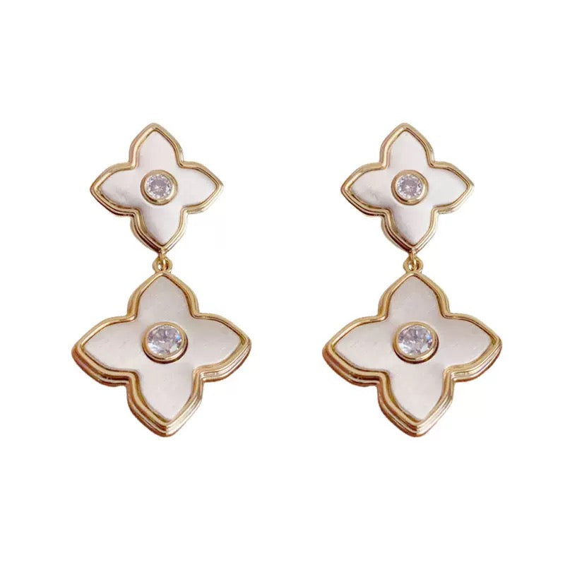 Custom double clover earrings with mother of pearl in 18k yellow gold .