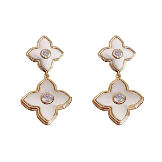 Custom double clover earrings with mother of pearl in 18k yellow gold .