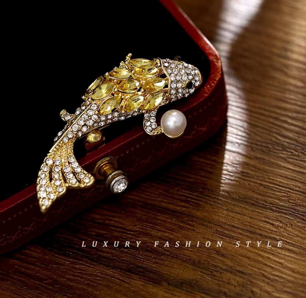 Elegant Gold Fish Brooch with Pearl Accent