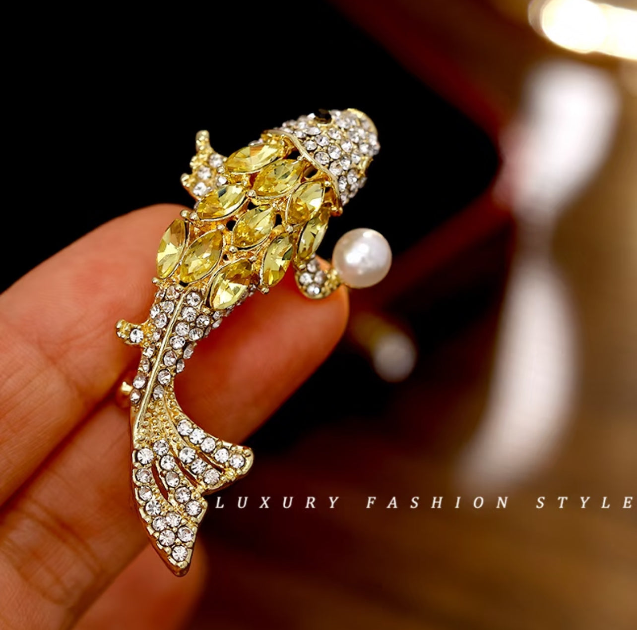 Elegant Gold Fish Brooch with Pearl Accent