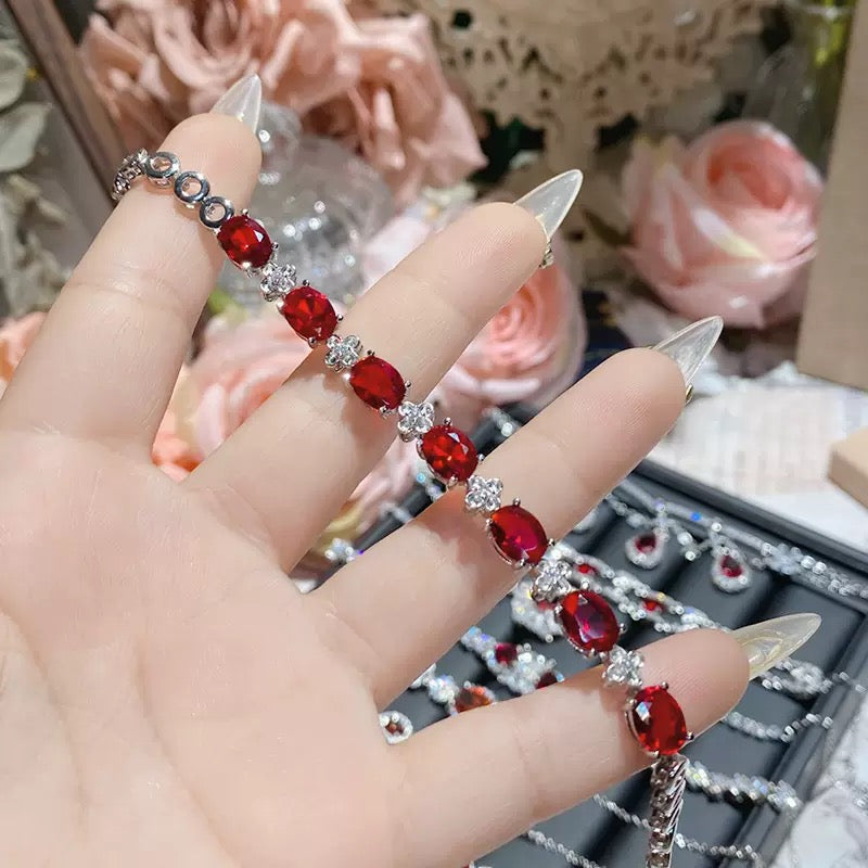 Cubic zirconia red garnet crystal in silver plated