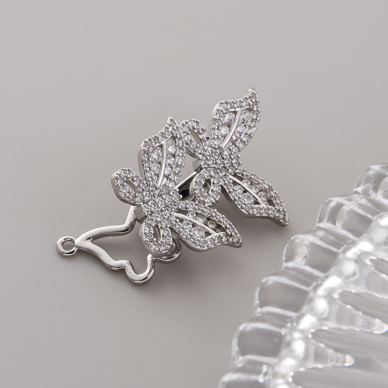 Double butterfly clasp