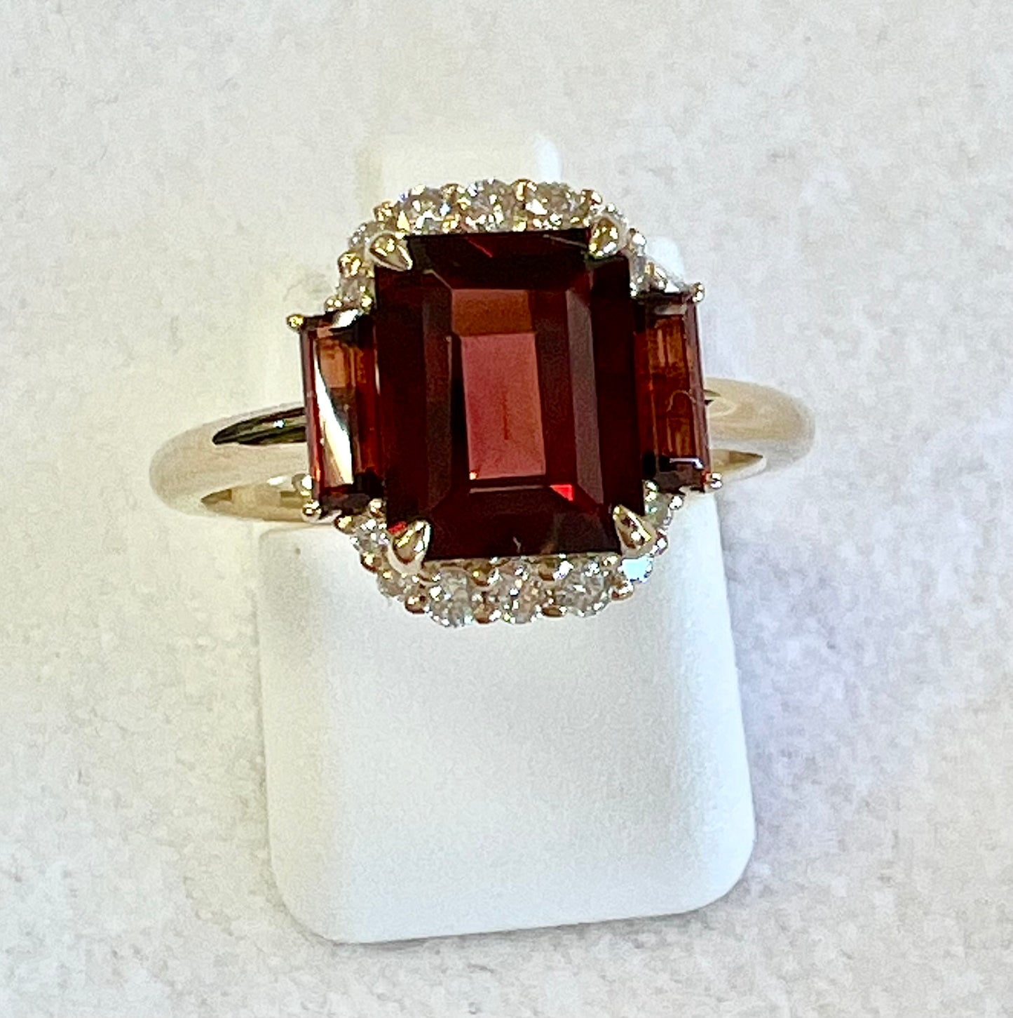 14 karat yellow gold natural garnet and lab grown diamond ring