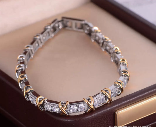 Two tone cubic zirconia tennis X bracelet
