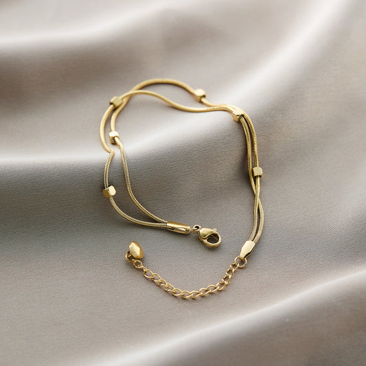 Double strand snake station anklet