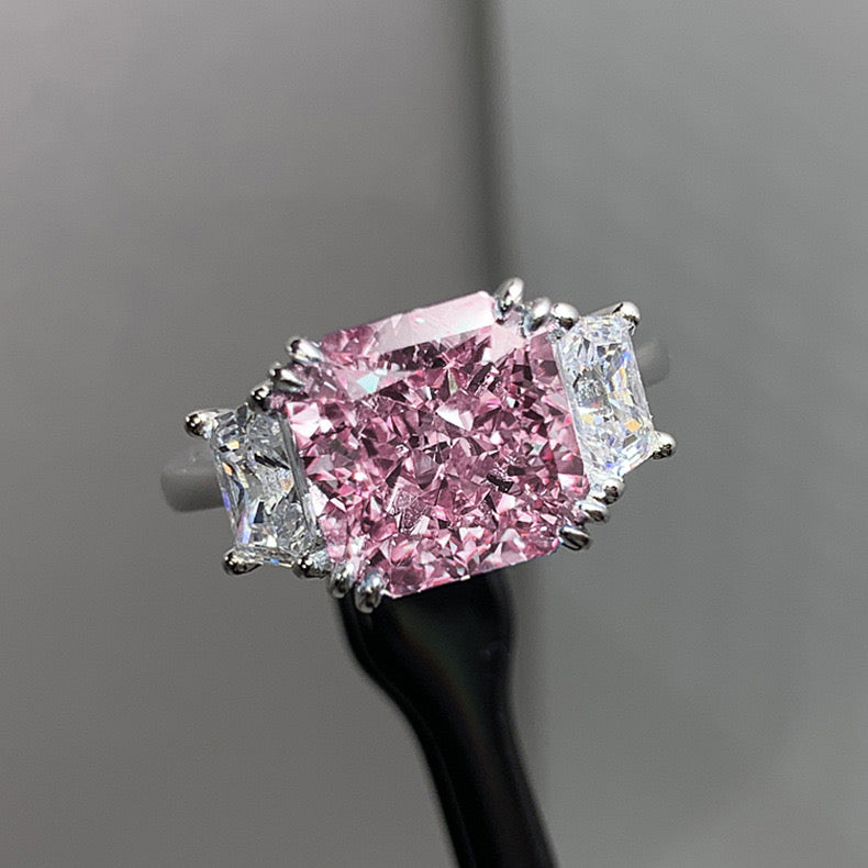 Princess cut pink crystal and emerald cut sigh