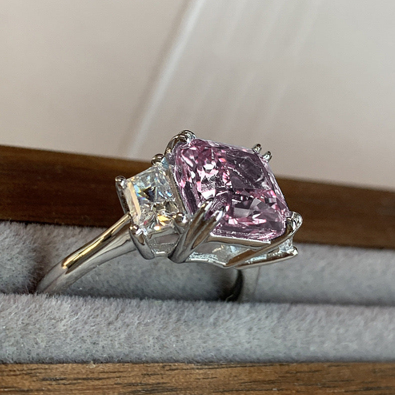 Princess cut pink crystal and emerald cut sigh
