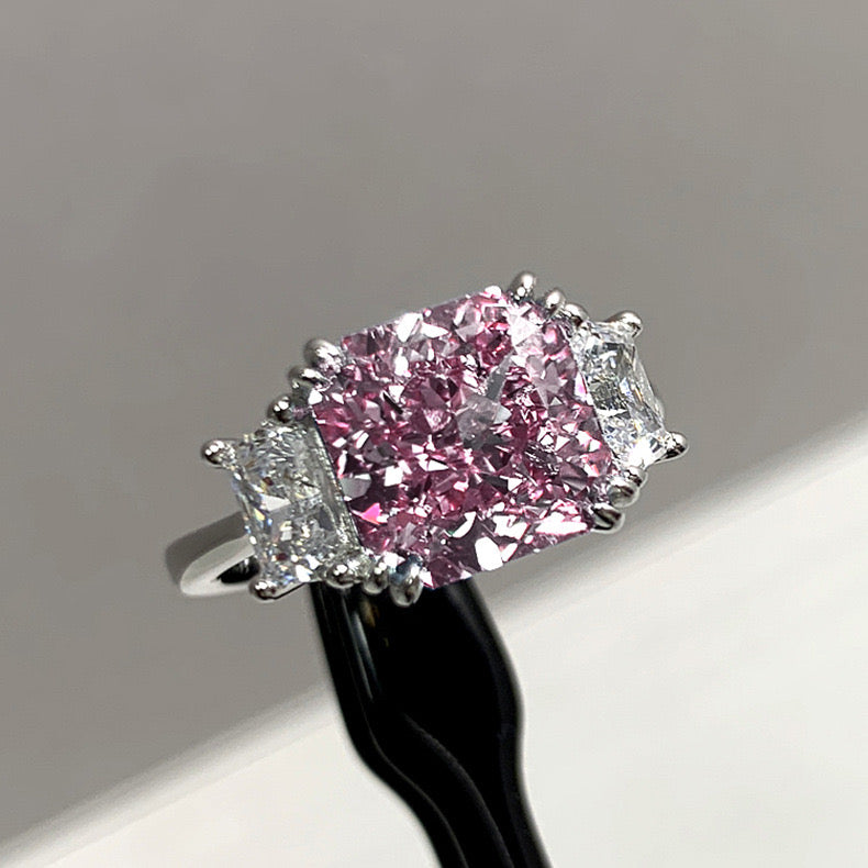 Princess cut pink crystal and emerald cut sigh