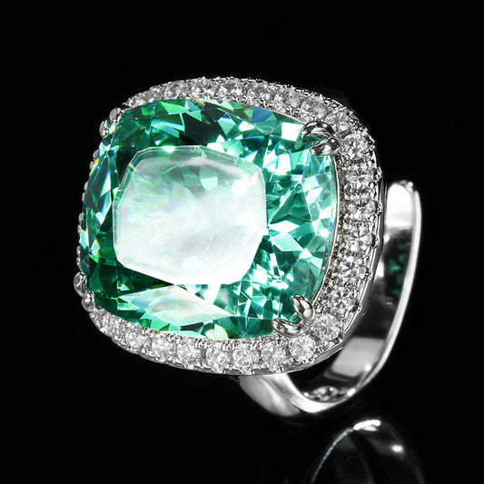 Cushion cut teal green tourmaline similant cubic zirconia rhodium plated ring