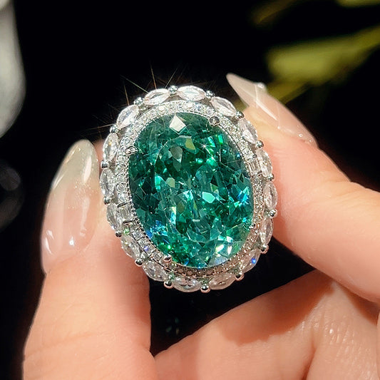 Oval teal green tourmaline similant rhodium plated ring