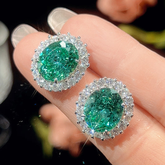 Oval teal green tourmaline similant rhodium plated earrings ( earrings only)