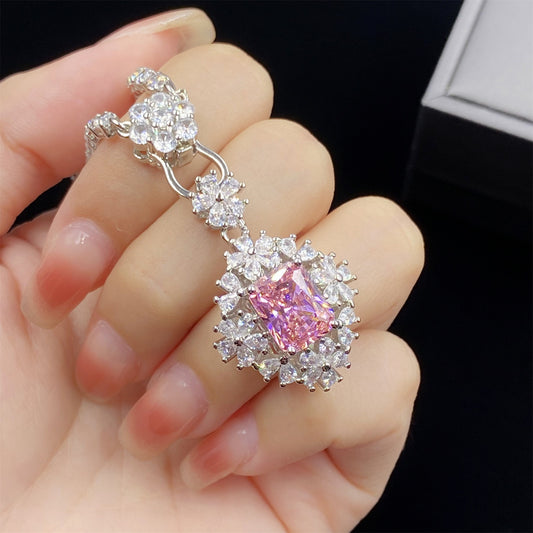 Radiant cut pink ice cubic zirconia ring