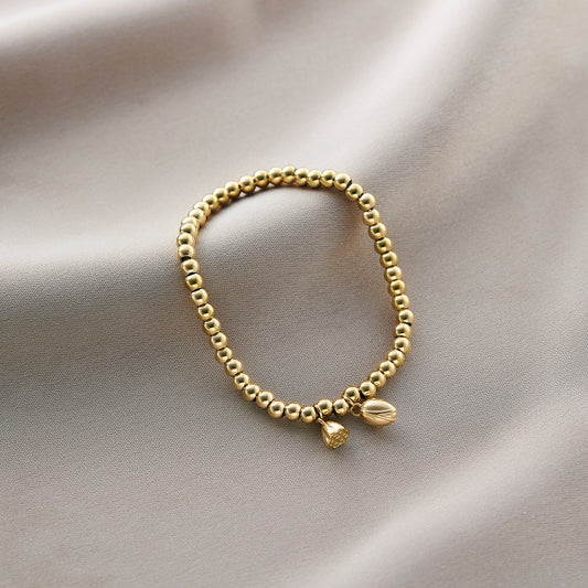 4 mm gold plated bead charm bracelet