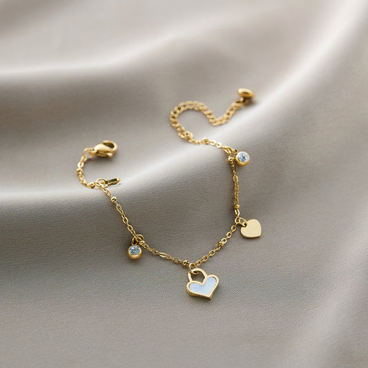 Mother of pearl heart bezel cubic zirconia charm bracelet
