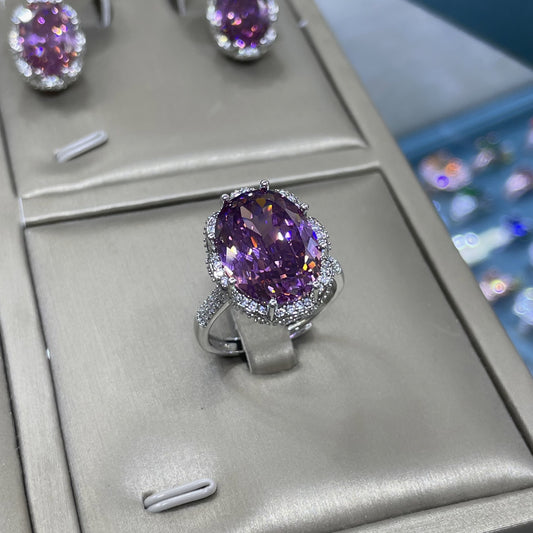 Oval purple cubic zirconia ring in rhodium plated