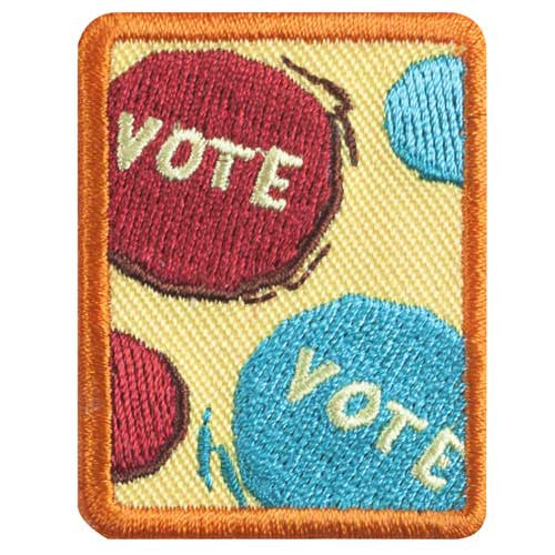 senior behind the ballot badge