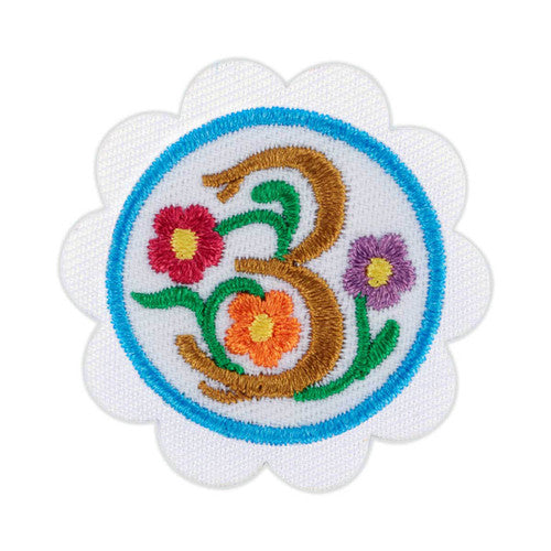 daisy design with nature badge